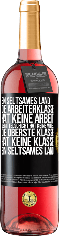 29,95 € Kostenloser Versand | Roséwein ROSÉ Ausgabe Ein seltsames Land: Die Arbeiterklasse hat keine Arbeit, die Mittelschicht hat keine Mittel, die oberste Klasse hat keine Klasse Schwarzes Etikett. Anpassbares Etikett Junger Wein Ernte 2025 Tempranillo