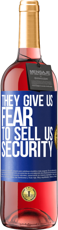 29,95 € | Розовое вино Издание ROSÉ Они дают нам страх, чтобы продать нам безопасность Синяя метка. Настраиваемая этикетка Молодое вино Урожай 2023 Tempranillo