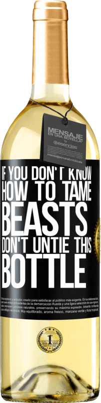 29,95 € Бесплатная доставка | Белое вино Издание WHITE Если вы не знаете, как приручить зверей, не развязывайте эту бутылку Черная метка. Настраиваемая этикетка Молодое вино Урожай 2023 Verdejo