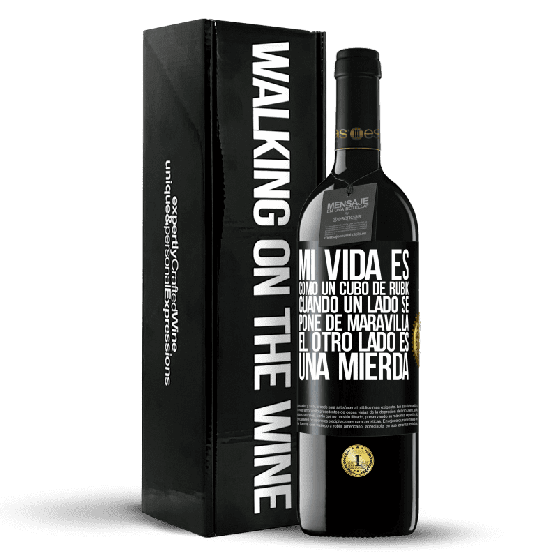 39,95 € Envío gratis | Vino Tinto Edición RED MBE Reserva Mi vida es como un cubo de rubik. Cuando un lado se pone de maravilla, el otro lado es una mierda Etiqueta Negra. Etiqueta personalizable Reserva 12 Meses Cosecha 2016 Tempranillo