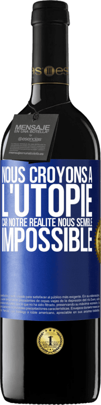 Envoi gratuit | Vin rouge Édition RED MBE Réserve Nous croyons à l'utopie car notre réalité nous semble impossible Étiquette Bleue. Étiquette personnalisable Réserve 12 Mois Récolte 2014 Tempranillo