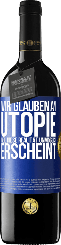 Kostenloser Versand | Rotwein RED Ausgabe MBE Reserve Wir glauben an Utopie, weil diese Realität unmöglich erscheint Blaue Markierung. Anpassbares Etikett Reserve 12 Monate Ernte 2014 Tempranillo