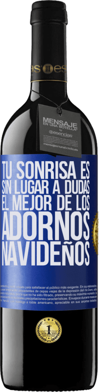 39,95 € | Vino Tinto Edición RED MBE Reserva Tu sonrisa es, sin lugar a dudas, el mejor de los adornos navideños Etiqueta Azul. Etiqueta personalizable Reserva 12 Meses Cosecha 2016 Tempranillo