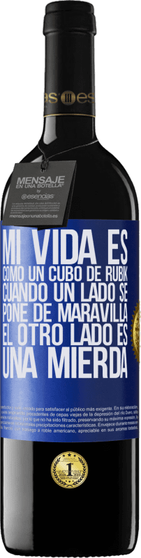 39,95 € | Vino Tinto Edición RED MBE Reserva Mi vida es como un cubo de rubik. Cuando un lado se pone de maravilla, el otro lado es una mierda Etiqueta Azul. Etiqueta personalizable Reserva 12 Meses Cosecha 2015 Tempranillo