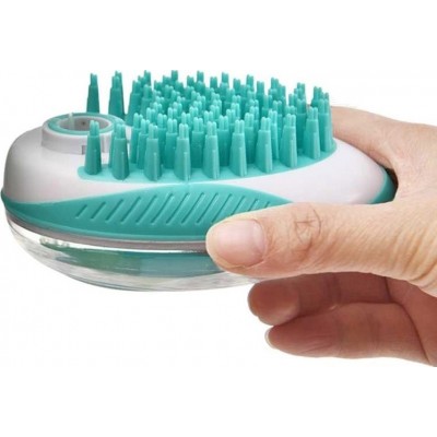 Pet bath massage. Brush. Grooming. Comb for shampooing and massaging Green