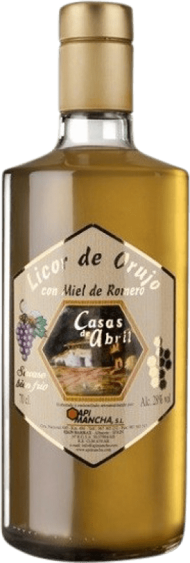 Envio grátis | Aguardente Orujo Casas de Abril Miel Castela-Mancha Espanha 70 cl