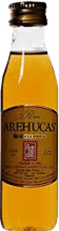 Envio grátis | Rum Arehucas Miel Guanche Ilhas Canárias Espanha Garrafa Miniatura 5 cl