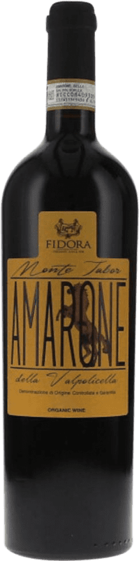 Бесплатная доставка | Красное вино Fidora Monte Tabor D.O.C.G. Amarone della Valpolicella Venecia Италия Corvina, Rondinella, Corvinone 75 cl