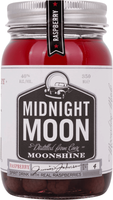Envío gratis | Licores Midnight Moon Moonshine Estados Unidos Tarro Medium 35 cl Raspberry — Frambuesa